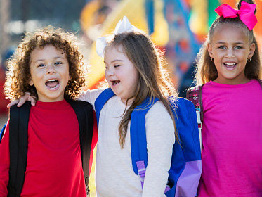 Smiling kids standing